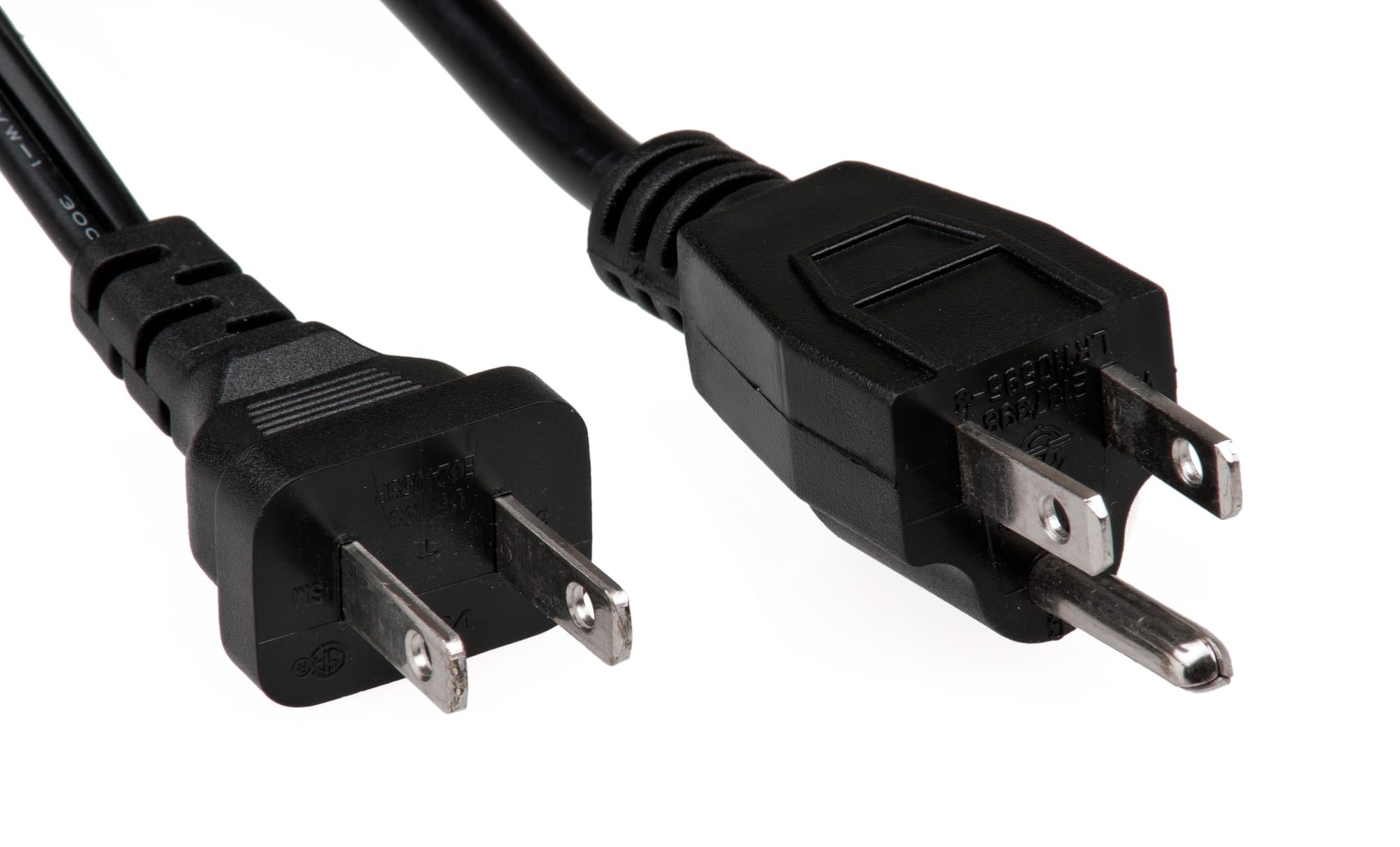 Two black North American power plugs, two-pin and three-pin, on a white background